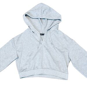 Women’s Grey cropped hoodie with drawstring hood and long sleeves. Size small